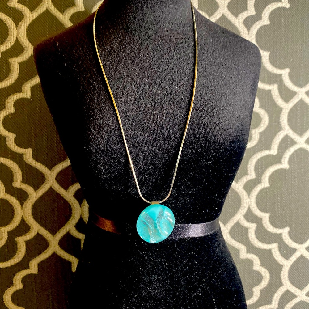 Glass pendant Tiffany blue and silver. On silver tone chain.